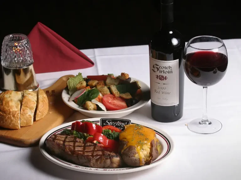 Steak and wine on a table