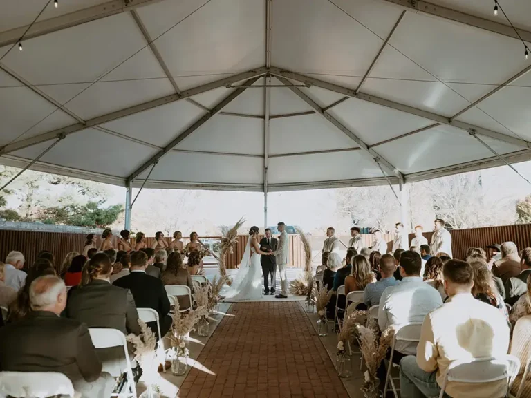 Outdoor Wedding in a Large White Tent